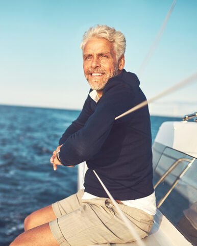 Man on a boat smiling