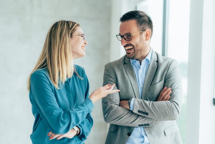 Woman and a man laughing