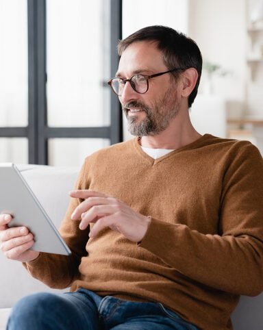 Man on ipad