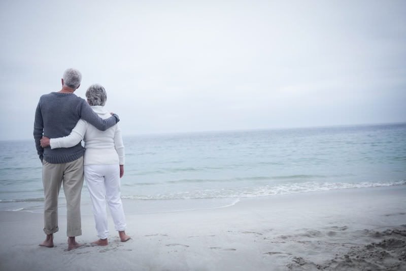 Elderly couple on beach