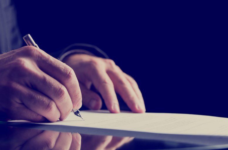 Handing holding pen and paper