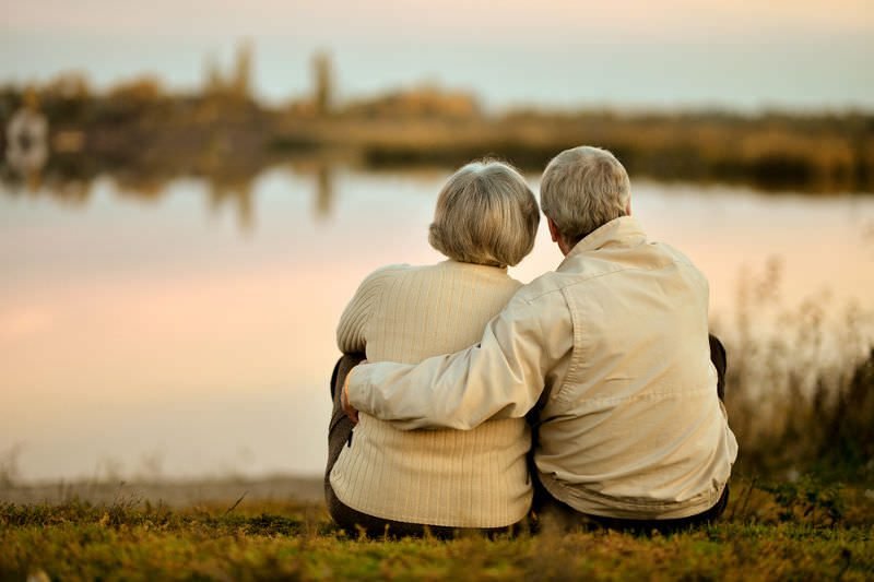 Older couple on lake