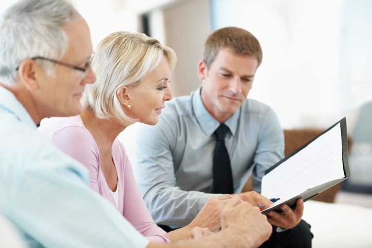 Three people in a meeting