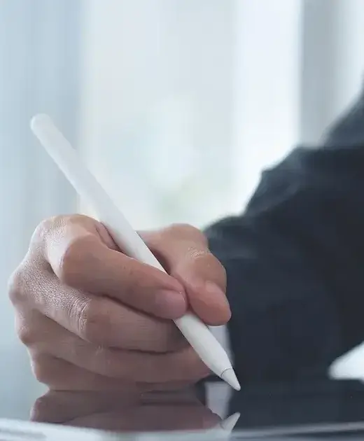 Hand with pen